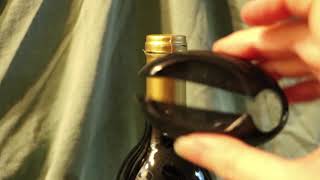 How to Use a Screwpull or Similar Wine Bottle Foil Cutter [upl. by Eelynnhoj]