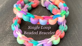 How To Make a Rubber Band Beaded Bracelet [upl. by Enelhtac]