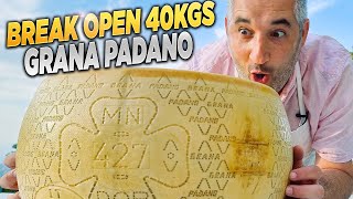 How to Break Open 40kgs CHEESE WHEEL Grana Padano [upl. by Hinkle588]