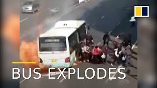 Bus explodes minutes after passengers escape [upl. by Lyle]